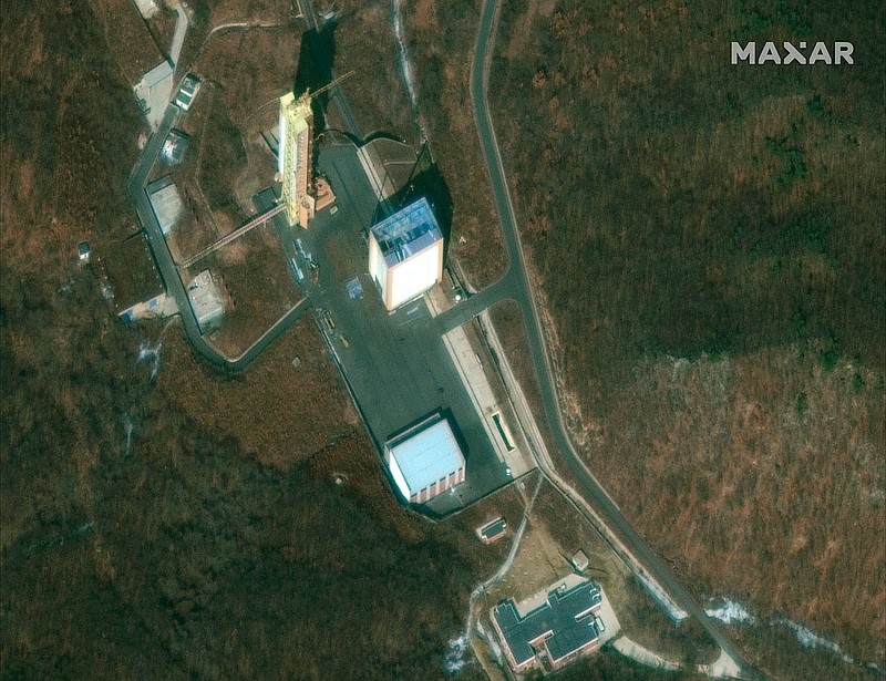 This satellite image provided by DigitalGlobe captured on March 2, 2019, and shows the launch tower at the Sohae Satellite Launch Facility in Tongchang-ri, North Korea. North Korea is restoring facilities at the long-range rocket launch site, which it dismantled last year as part of disarmament steps, according to foreign experts and a South Korean lawmaker who was briefed by Seoul's spy service. The finding follows a high-stakes nuclear summit last week between North Korean leader Kim Jong Un and President Donald Trump that ended without any agreement. (DigitalGlobe, a Maxar company, via AP)