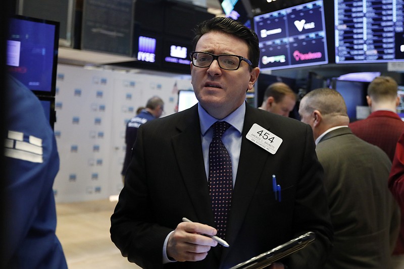 Trader Americo Brunetti works on the floor of the New York Stock Exchange, Thursday, March 7, 2019. U.S. stocks moved lower in morning trading, led by banks and technology companies, putting the market on track for its first losing week since January. (AP Photo/Richard Drew)