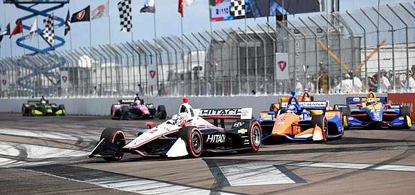 Team Penske driver Josef Newgarden leads through turn one during the Grand Prix of St. Petersburg on Sunday in St Petersburg, Fla.