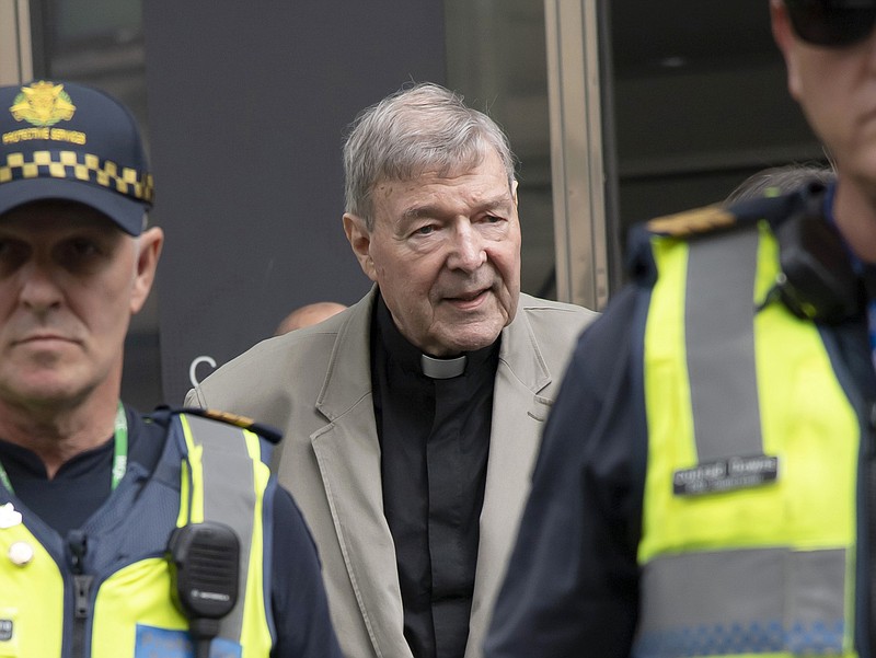 FILE - In this Feb. 26, 2019, file photo, Cardinal George Pell arrives at the County Court in Melbourne, Australia. The most senior Catholic to be convicted of child sex abuse will be sentenced to prison on Wednesday, March 13, 2019 in an Australia landmark case that has polarized observers. Some described the prosecution as proof the church is no longer above the law, while others suspect Cardinal George Pell has been made a scapegoat for the church’s sins. (AP Photo/Andy Brownbill, File)