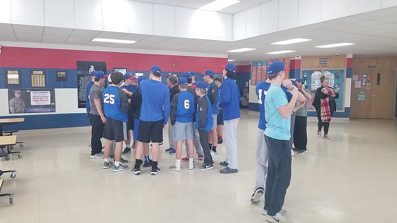 The California Pintos team huddles up indoors. The 2019 season begins with the Pintos playing at Eugene March 18.