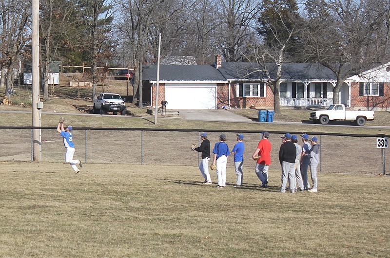 The Russellville Indians baseball team practices March 11, 2019.