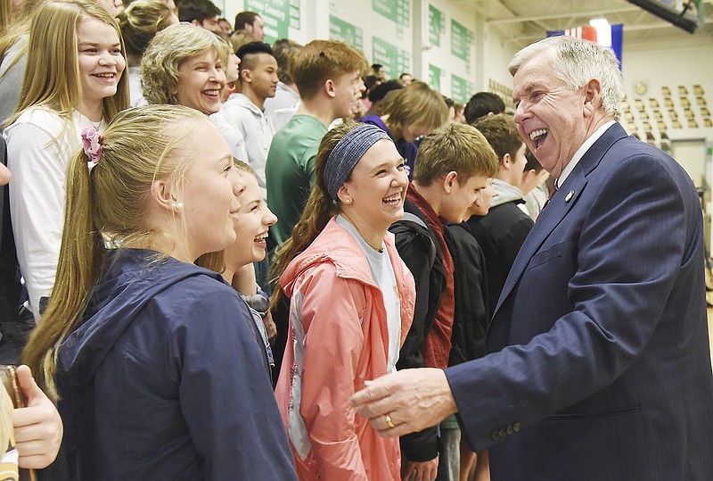 Gov. Mike Parson visited Blair Oaks High School students Wednesday morning after signing an executive order creating a Missouri School Safety Task Force. They are, from left, Ashley Fennewald, Molly Jurgensmeyer and Lauren Strange, all sophomores at the high school in Wardsville.