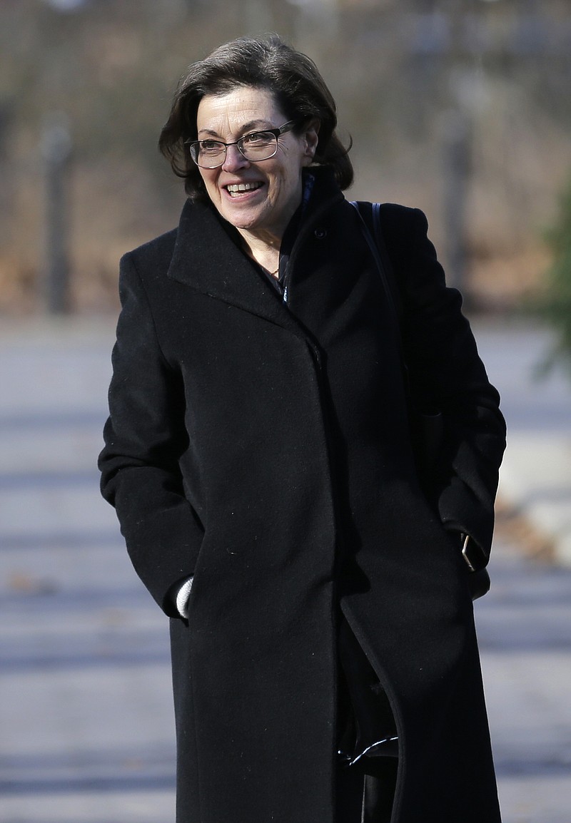 FILE - In this Jan. 28, 2019 file photo, Nancy Salzman arrives to Brooklyn federal court in New York. Salzman, a co-founder of an embattled upstate New York self-help organization is expected to plead guilty in a case featuring sensational claims that some followers became branded sex slaves. Salzman is due in federal court in Brooklyn on Wednesday, March 13 for a plea hearing. There was no response to a request for comment from one of her lawyers. (AP Photo/Seth Wenig, File)