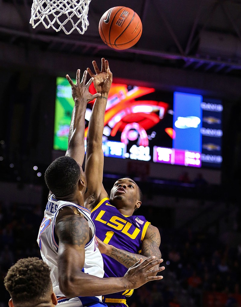 LSU guard Javonte Smart shoots over Florida center Kevarrius Hayes during a game earlier this month in Gainesville, Fla.