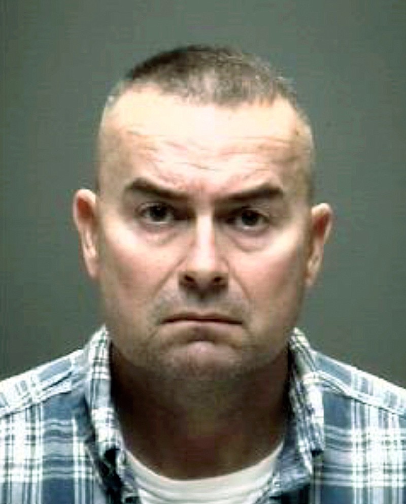 In this Tuesday, March 12, 2019 booking mug is Galveston, Texas police officer Dion Allen Watson who is charged with indecency with a child by sexual contact. The 50-year-old Watson was taken into custody based on an arrest warrant issued Tuesday. Galveston County sheriff's officials say the investigation began in January when school administrators forwarded allegations of abuse to Child Protective Services. A sheriff's affidavit alleges Watson inappropriately touched the girl over a four-year period. (AP Photo/Galveston County Sheriff)