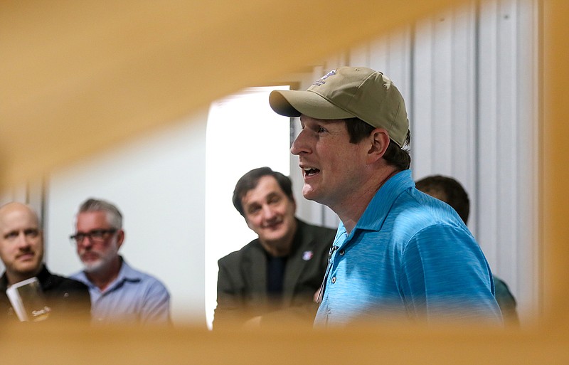 Michael Lee, construction technology coordinator for Texarkana College, speaks to the attendees of the EDC executive committee about what students are learning at the Betty & Buddy Workforce Training Center on Thursday in Texarkana, 
Texas.