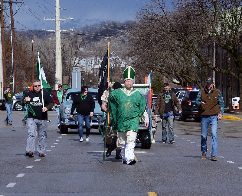 Sally Ince/ News Tribune
Participants march down Bolivar Street Saturday March 9, 2019 during the St. Patrick's Day Parade. This was the 19th year the parade was held. The parade is traditionally held the weekend before St. Patricks Day beginning at Paddy Malone's Irish Pub. This year the parade route changed to taking Bolivar Street to High Street to accommodate construction around the Captiol building. 