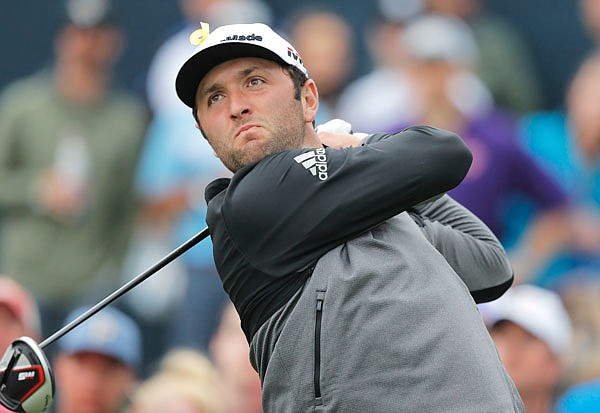 Jon Rahm hits off the 16th tee during Saturday's third round of The Players Championship in Ponte Vedra Beach, Fla.