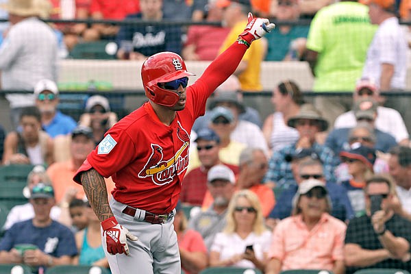 Cardinals second baseman Kolten Wong celebrates his home run off Tigers starting pitcher Michael Fulmer during the first inning of a spring training game last week in St. Petersburg, Fla.