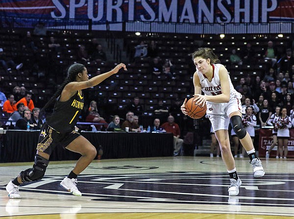 Jefferson City's Sarah Linthacum leaps to steal a long pass intended for North Kansas City's Ja'mya Powell-Smith during Saturday night's Class 5 championship game at JQH Arena in Springfield.