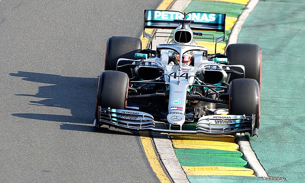 Mercedes driver Lewis Hamilton goes through turn 2 during Saturday's qualifying for the Australian Grand Prix in Melbourne, Australia.
