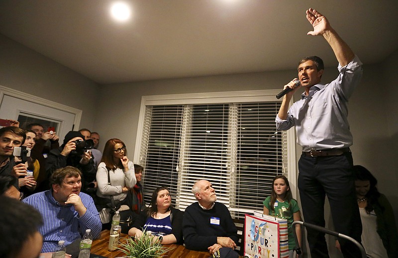 Democratic presidential candidate Beto O'Rourke, right, speaks at an event at the home of Dubuque County Recorder John Murphy in Dubuque, Iowa on Saturday, March 16, 2019. (Eileen Meslar/Telegraph Herald via AP)