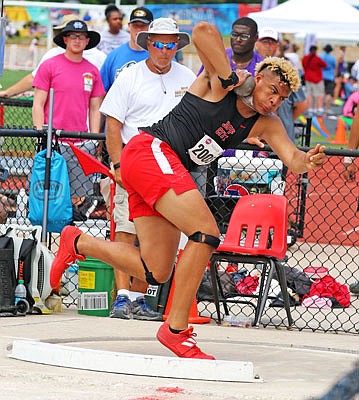 Devin Roberson of Jefferson City prepares to make a throw during the shot put competition last year in the Class 5 state championships at Adkins Stadium.