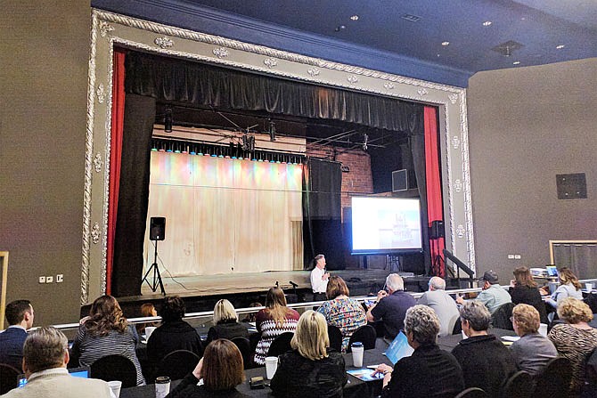 Missouri Division of Tourism director Ward Franz talks Monday to a crowd of tourism professionals from the mid-Missouri area at Fulton's Brick District Playhouse. MDT is touring the state to update regions on tourism in Missouri.