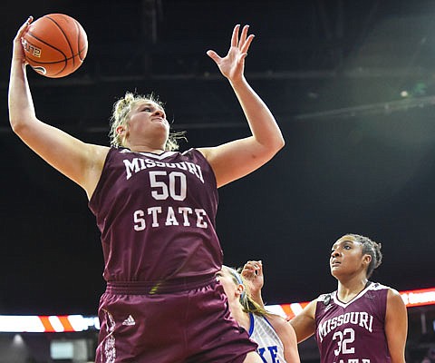 Missouri State's Emily Gartner jumps for a rebound during Sunday's Missouri Valley Conference Tournament title game against Drake in Moline, Ill.