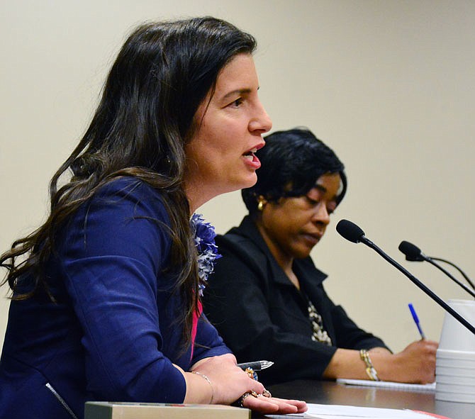 Jefferson City candidates for mayor, Carrie Tergin and Tiwan J. Lewis, square off during Tuesday's election forum at City Hall.