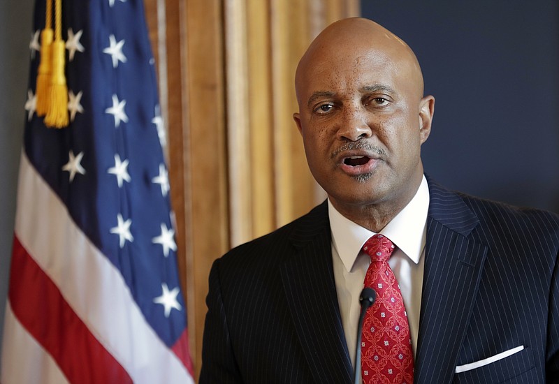 FILE - In this July 9, 2018, file photo, Indiana Attorney General Curtis Hill speaks during a news conference at the Statehouse in Indianapolis. The Indiana Supreme Court Disciplinary Commission is accusing state Attorney General Curtis Hill of professional misconduct following allegations he drunkenly groped a female lawmaker and three female legislative staffers at a bar. A disciplinary complaint filed Tuesday, March 19, 2019 says Hill committed misdemeanor battery against all four women and felony sexual battery against one of them. A special prosecutor declined in October to pursue criminal charges against Hill, who has denied wrongdoing. (AP Photo/Michael Conroy, File)