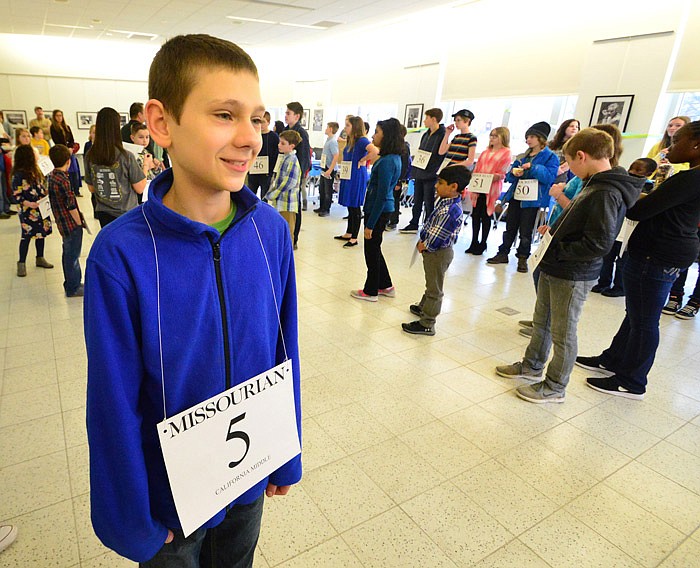 Spelling Bee contestant Dillon Wood of California Middle School waits with others at the registration area prior to the second annual Columbia Missourian Regional Spelling Bee Wednesday, March 13, 2019 at the University of Missouri. Multiple area schools participated in the regional spelling bee. The Scripps National Spelling Bee is the nation's largest and longest-running educational program. 55 elementary and middle school students from eight mid-Missouri counties competed in the event to qualify for the Scripps National Spelling Bee known as Bee Week. 
