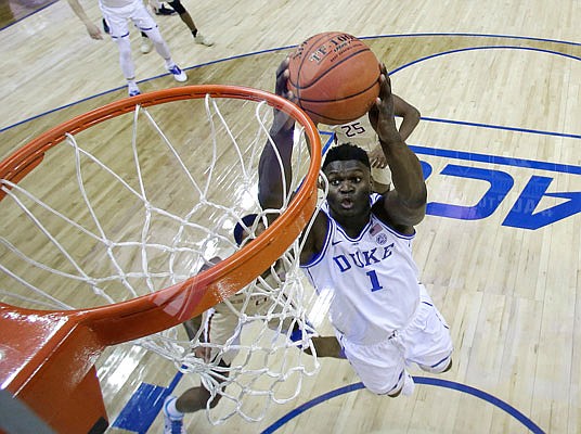 Zion Williamson of Duke goes up to dunk Saturday against Florida State during the ACC Tournament title game in Charlotte, N.C.