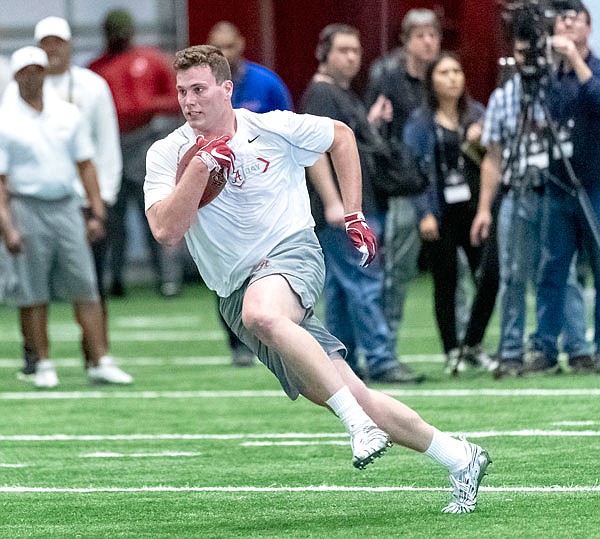 Hale Hentges works through individual drills Tuesday, March 19, 2019, at Alabama's pro day in Tuscaloosa, Ala.