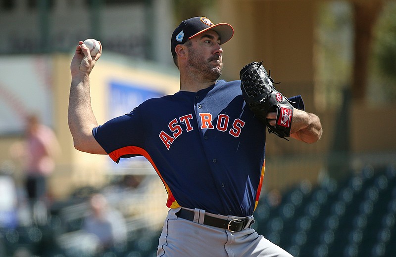 In this March 7, 2019, file photo, Houston Astros pitcher Justin Verlander throws during the first inning of a spring training baseball game against the Miami Marlins at the Roger Dean Chevrolet Stadium on Thursday, in Jupiter, Fla. (David Santiago/Miami Herald via AP, File)