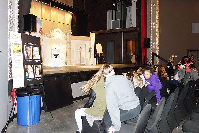 Sixth-graders from Fulton Middle School settle in to watch "Heroes, Monsters and Myths" at the Brick District Playhouse. The Imaginary Theater Company, a traveling troupe based out of St. Louis, visited town Wednesday.