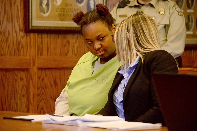 Quatavia Givens talks to her public defender Thursday, March 21, 2019, during a bond hearing at the Cole County Courthouse. Givens has been accused of child abuse contributing to the death of 4-year-old Darnell Gray. 