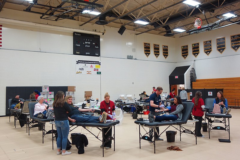Teachers, community members and studnts donate blood in the Fulton High School gym on Friday, March 22, 2019.