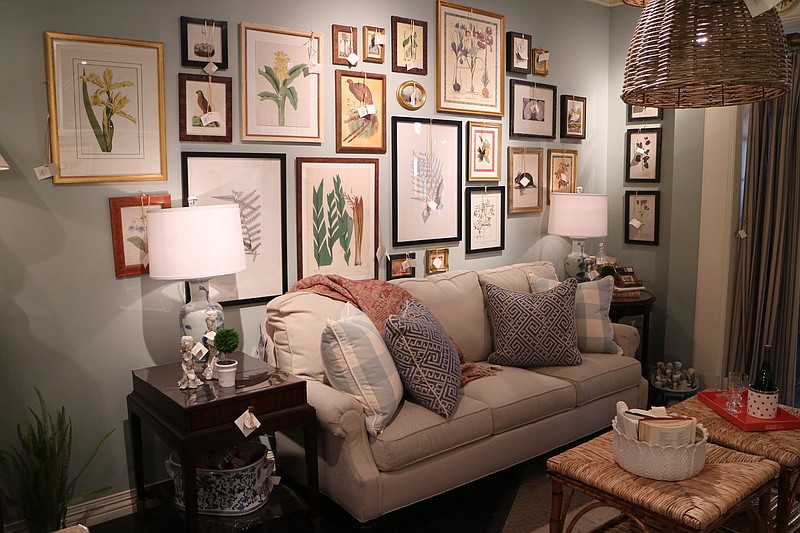 A gallery wall is a great way to display multiple pieces of art when you can't pick a favorite. Mix in different frames, sizes and textures to create a fun and interesting design. (Handout/TNS)