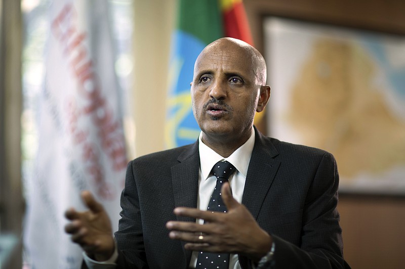Tewolde Gebremariam, Chief Executive Officer of Ethiopian Airlines, speaks to The Associated Press at Bole International Airport in Addis Ababa, Ethiopia Saturday, March 23, 2019. The chief of Ethiopian Airlines says the warning and training requirements set for the now-grounded 737 Max aircraft may not have been enough following the Ethiopian Airlines plane crash that killed 157 people. (AP Photo/Mulugeta Ayene)