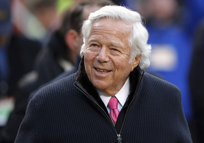 FILE - In this Jan. 20, 2019, file photo, New England Patriots owner Robert Kraft walks on the field before the AFC Championship NFL football game in Kansas City, Mo. Florida prosecutors have offered a plea deal to Kraft and other men charged with paying for illicit sex at a massage parlor. The Palm Beach State Attorney confirmed Tuesday, March 19, 2019, it has offered Kraft and 24 other men charged with soliciting prostitution the standard diversion program offered to first-time offenders.  (AP Photo/Charlie Neibergall, File)