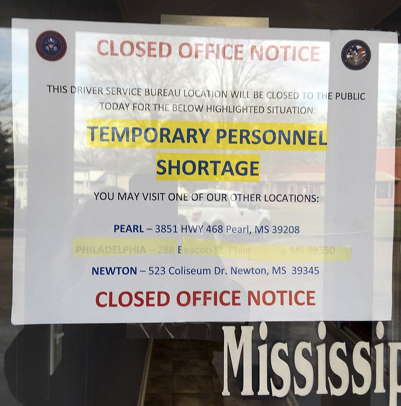 In this March 12, 2019, photograph, a sign shows that the driver's license station in Walnut Grove, Miss., is closed because of short staffing. (AP Photo/Emily Wagster Pettus)