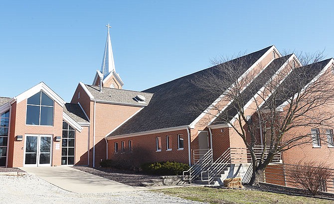 The steeple of the 150-year-old Immanuel Lutheran Church in Honey Creek stands tall and bright against Friday's clear, blue sky. The congregation built a new sanctuary, seen at right, in the mid-1990s followed years later by a new school.