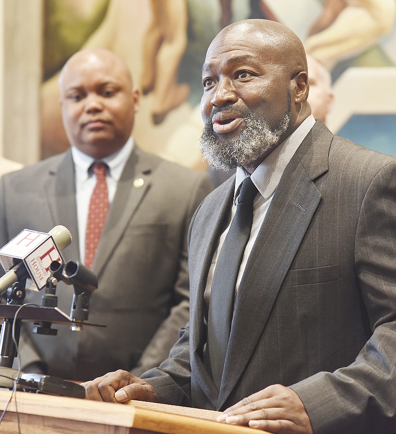 The Special Committee on Criminal Justice held a news conference Monday in the House of Representatives Lounge in the Capitol during which Matthew Charles, at microphone, addressed reporters. Charles, of Nashville, Tennessee, is visiting several states who are working on prison sentencing reforms. Standing in the background is Shamed Dogan, R-Ballwin, chair of the special committee.