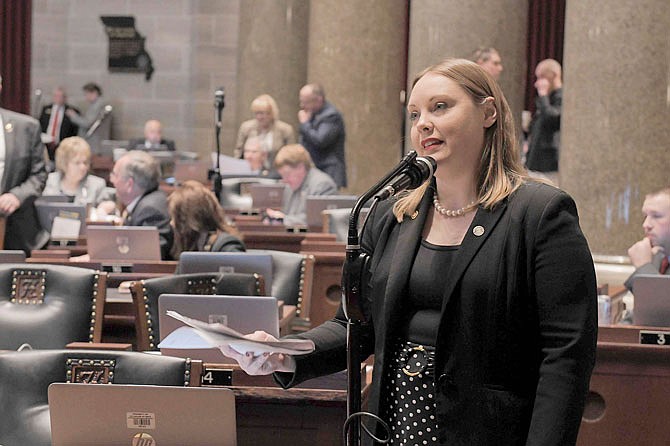 In this March 29, 2019 photo, state Rep. Sara Walsh, R-Ashland, speaks during debate over Missouri's state budget.