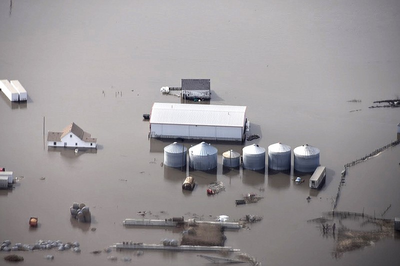 FILE - This Monday, March 18, 2019 file photo made by the South Dakota Civil Air Patrol and provided by the Iowa Department of Homeland Security and Emergency Management shows flooding along the Missouri River in rural Iowa north of Omaha, Neb. (Iowa Homeland Security and Emergency Management via AP, File )