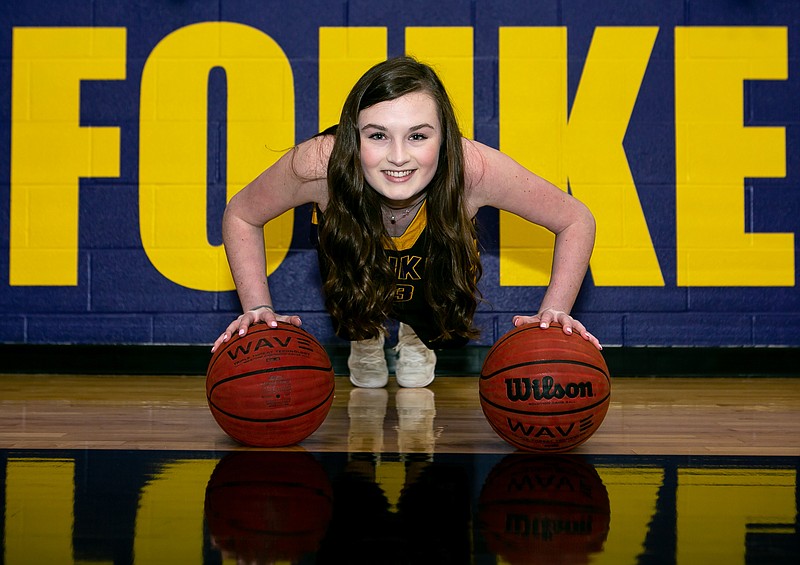 Taylor Hardin poses for a portrait Thursday in the Fouke, Ark., basketball gym. Hardin, a junior at Fouke High School, scored her 1,000th point this basketball season after being diagnosed with idiopathic thrombocytopenic purpura. Taylor goes back to the doctor for a check-up in early April, but she and her parents are hopeful that she has this condition beat. 