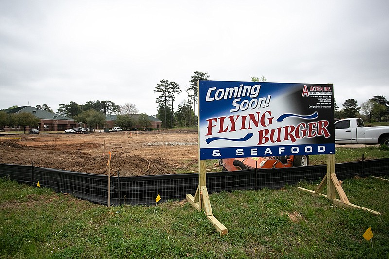 A sign sits at the future site of Texarkana's Flying Burger.