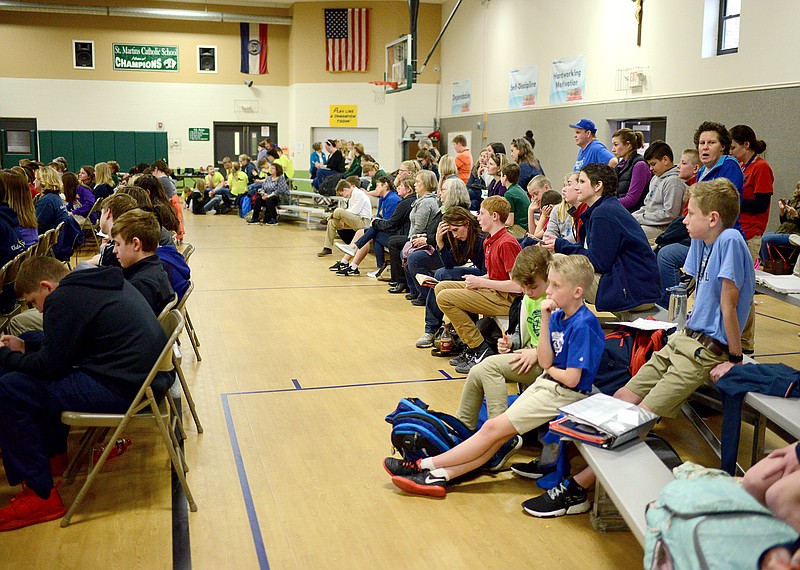 Sally Ince/ News Tribune
Students and their families wait anxiously as the 6th-grade competition nears the end Tuesday April 2, 2019 during the Diocesan Spelling Bee at St. Martin Catholic School. The competition was held for students grades 4th-8th within the Jefferson City Diocese and surrounding parochial schools. Schools could enter two students to compete for each grade competition with 1st-3rd place winners being recognized. 