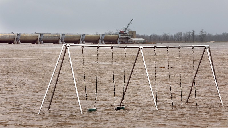 The playground in Clarksville Riverfront Park is flooded in downtown Clarksville, Mo., Saturday, March 30, 2019. The Mississippi River reached 32.8 feet Saturday afternoon, entering major flood stage for the first time this spring. It is expected to crest late Sunday at 34.2 feet, more than three feet below the 37.7 foot record of 1993. (Robert Cohen/St. Louis Post-Dispatch via AP)