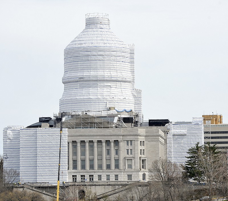 The Missouri Office of Administration announced Monday that renovation work on the exterior of the Capitol is nearing the halfway point and the dismantling of scaffolding on the east horseshoe has begun. The horseshoe encompasses the east, northeast and southeast portions of the Capitol and soon work will begin on the opposite side of the building. Recent high winds have ripped away portions of the protective covering but the material is designed to do just that in high winds in order to prevent the scaffolding from being damaged or lifted. Officials said later this spring the scaffolding will be in place on the west and southwest sides and covered with the protective wrap.