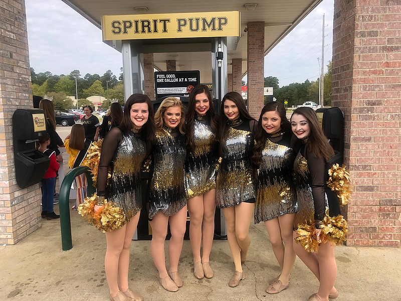 Pleasant Grove High School Showstoppers celebrated the launch of the school's Spirit Pump March 28 at the Road Runner convenience store in Nash. Three cents per gallon purchased at the Spirit Pump will be donated to the district. Shown are, from left: Laura Beth Maddox, Catherine Wright, Holly Thornton, Zoe May, Hailee Partin and Jordan Poe. (Submitted photo)