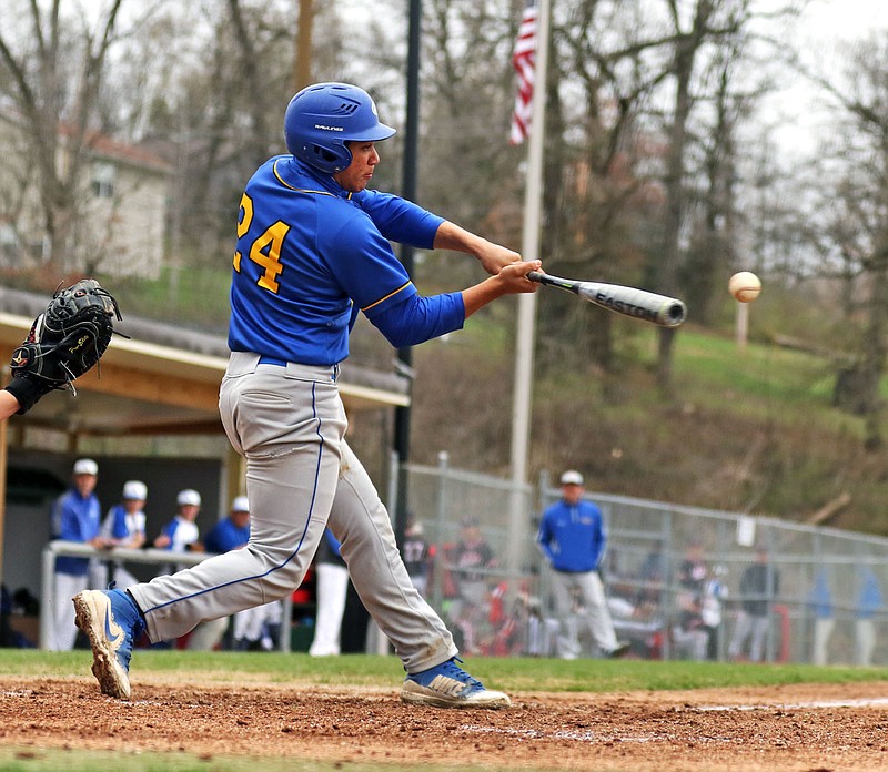 Jaden Hoskins of Fatima connects on a pitch for a double during the sixth inning of Friday's game against Lutheran: St. Charles in the Capital City Invitational at Vivion Field.