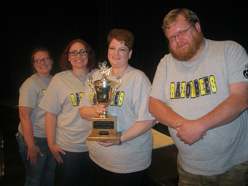 Members of the Texarkana, Ark., School District team celebrate winning the final round of competition in the 25th annual Literacy Council's Corporate Spelling Bee. This was TASD's first time ever to compete in this yearly fundraiser.