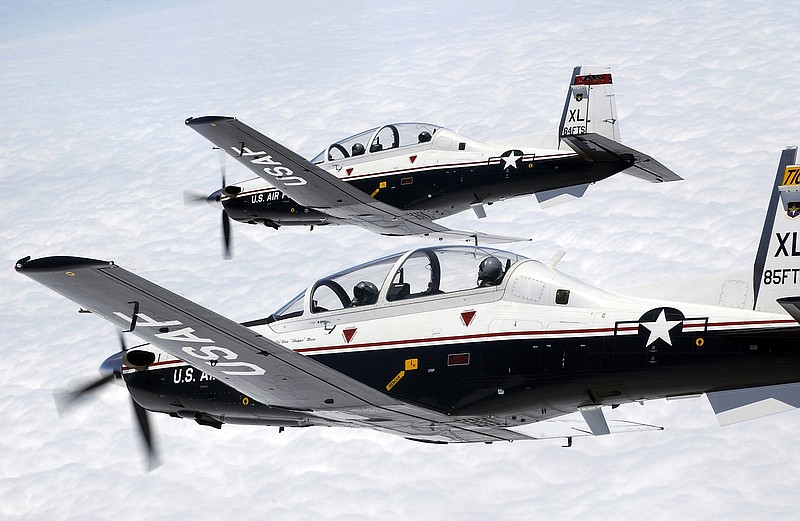 A pair of T-6 Texans fly in formation over Laughlin Air Force Base in Texas. T-6A Texan II two-ship aerial demonstrations were scheduled to be a part of the 2019 Memorial Day weekend airshow in Jefferson City; however, flooding along the Missouri River forced the show to be canceled.