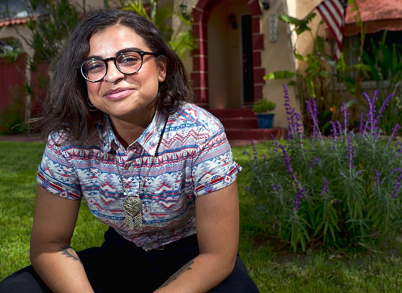 In this April 8, 2019 photo Naia Al-Anbar poses in the Glendale section of Los Angeles. Anbar, who generally supports the idea of a new category, on the 2020 census said. "The truth is we aren't ever going to be white in their eyes and we will still be discriminated against." Al-Anbar, who has a Saudi Arabian father, would mark "other" on the census if a more precise category isn't offered. (AP Photo/Richard Vogel)