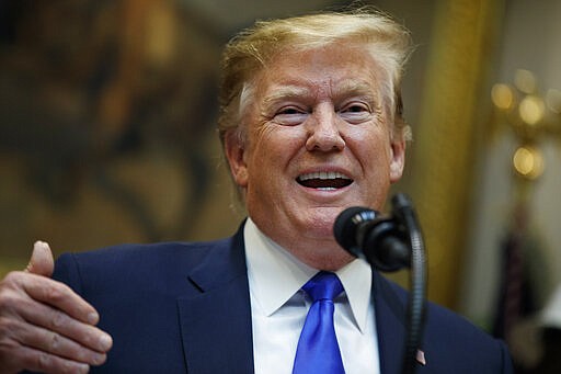 President Donald Trump gestures Friday as he speaks about the deployment of 5G technology in the United States during an event in the Roosevelt Room of the White House.