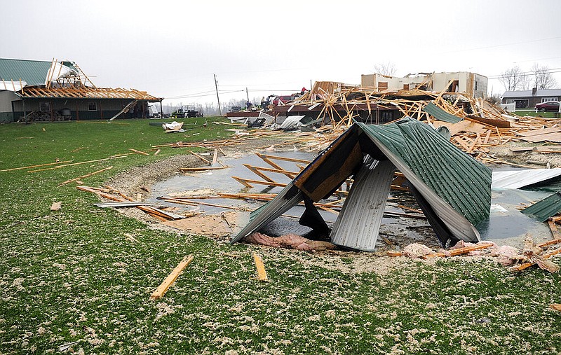 Severe storm damage to homes is seen on Plymouth Springmill Road just south of the intersection of Ohio Route 96 in Shelby, Ohio, Sunday, April 14, 2019. (Tom E. Puskar/The Times Gazette via AP)