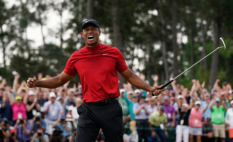 Tiger Woods reacts as he wins the Masters golf tournament Sunday in Augusta, Ga. 